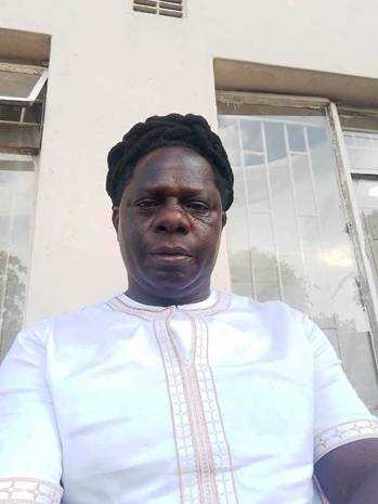 A person in a white shirt
AI-generated content may be incorrect.